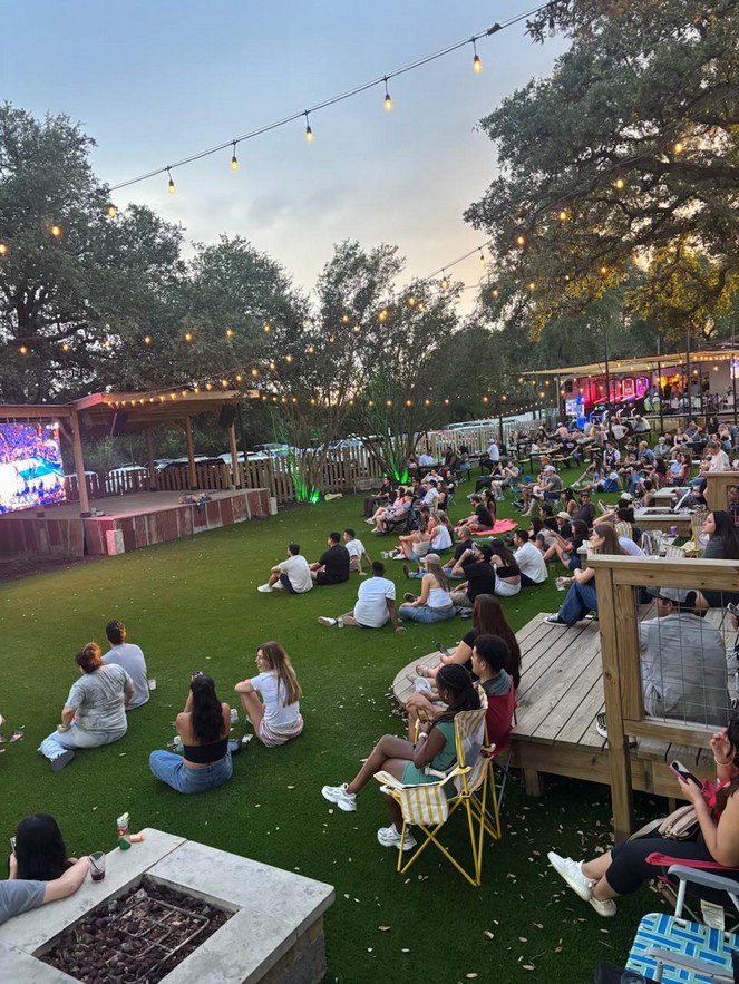 Rendering of the walkable South Austin Entertainment District at dusk
